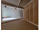 Basement access via carpeted stairs at 155 Vinnys Way, Covington, GA 30014