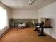 Unfinished basement with concrete floor, workbench, and storage shelving at 155 Vinnys Way, Covington, GA 30014