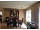 Formal dining room with chandelier and large window at 155 Vinnys Way, Covington, GA 30014
