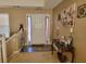 Bright entryway with tile flooring and decorative console table at 155 Vinnys Way, Covington, GA 30014