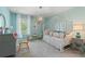 Charming bedroom with light blue walls, daybed, and playful decor at 413 Brooch Way, Stockbridge, GA 30281