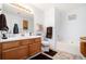 Bathroom with tub and double vanity at 1360 Paddocks Way, Powder Springs, GA 30127