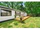 Charming backyard with a deck and lush green lawn at 1507 Lively Ridge Ne Rd, Atlanta, GA 30329