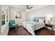 Spacious bedroom with hardwood floors, large windows, and a cozy sitting area at 1507 Lively Ridge Ne Rd, Atlanta, GA 30329