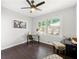 Bright bedroom with hardwood floors and a built-in workspace at 1507 Lively Ridge Ne Rd, Atlanta, GA 30329