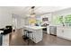 Modern kitchen with white cabinets and island at 1507 Lively Ridge Ne Rd, Atlanta, GA 30329