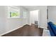 Convenient laundry area with dark hardwood floors and french doors at 1507 Lively Ridge Ne Rd, Atlanta, GA 30329