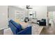 Comfortable living room with blue sofa and patio access at 1507 Lively Ridge Ne Rd, Atlanta, GA 30329