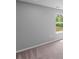 Bedroom with soft carpet and a window with leafy outdoor views at 126 Cherry Glen Way, Euharlee, GA 30145