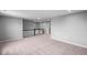 Expansive bonus room with new carpet, recessed lighting, and an open railing at 126 Cherry Glen Way, Euharlee, GA 30145
