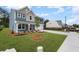 Two-story home with an attached two-car garage and a green lawn, located in a quiet neighborhood at 126 Cherry Glen Way, Euharlee, GA 30145