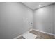 Functional laundry room featuring tile floors and utility connections for modern appliances at 126 Cherry Glen Way, Euharlee, GA 30145