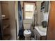 Small bathroom needs updating, includes toilet and sink at 3965 Pecan Rd, Loganville, GA 30052