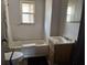 Bathroom needs updating, includes bathtub and sink at 3965 Pecan Rd, Loganville, GA 30052