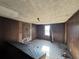 Needs renovation, features wood paneling at 3965 Pecan Rd, Loganville, GA 30052