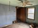 Needs complete renovation. Features a window and wood door at 3965 Pecan Rd, Loganville, GA 30052