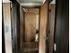 Hallway with several closed doors at 3965 Pecan Rd, Loganville, GA 30052
