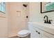 Updated bathroom with marble shower, white vanity, and modern fixtures at 895 Kings Grant Nw Dr, Atlanta, GA 30318
