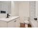 Clean bathroom with white subway tile and modern vanity at 895 Kings Grant Nw Dr, Atlanta, GA 30318