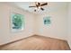 Spacious bedroom with large window and wood-look flooring at 895 Kings Grant Nw Dr, Atlanta, GA 30318