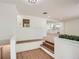 Bright entryway with built-in planter and steps leading to living area at 895 Kings Grant Nw Dr, Atlanta, GA 30318
