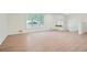 Open living area with hardwood floors and view of backyard at 895 Kings Grant Nw Dr, Atlanta, GA 30318