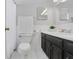 Clean bathroom, dark vanity, and updated fixtures at 285 Oxford Ne Pl # 4, Atlanta, GA 30307