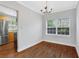 Bright dining area with hardwood floors and kitchen view at 285 Oxford Ne Pl # 4, Atlanta, GA 30307