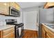 Updated kitchen with stainless steel appliances and wood cabinets at 285 Oxford Ne Pl # 4, Atlanta, GA 30307