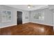 Dark door and hardwood floors in this bright living room at 285 Oxford Ne Pl # 4, Atlanta, GA 30307