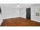 Living room with hardwood floors, gray walls and a dark door at 285 Oxford Ne Pl # 4, Atlanta, GA 30307