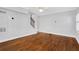 Hardwood floors and gray walls in this spacious living room at 285 Oxford Ne Pl # 4, Atlanta, GA 30307