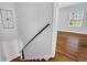 Wooden staircase leading to upper level at 285 Oxford Ne Pl # 4, Atlanta, GA 30307