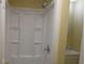 Updated bathroom with a shower/tub combo and vanity at 545 Oak Valley Dr, Riverdale, GA 30274
