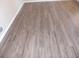 New gray wood-look vinyl flooring at 545 Oak Valley Dr, Riverdale, GA 30274