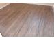 Gray-brown wood-look vinyl plank flooring at 545 Oak Valley Dr, Riverdale, GA 30274