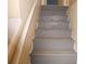 Gray painted wooden staircase at 545 Oak Valley Dr, Riverdale, GA 30274