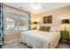 Spacious bedroom with large window, comfortable king-size bed, and stylish decor at 618 Cobblestone Cir, Canton, GA 30114