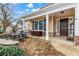 Brick paved porch with seating area and entryway at 618 Cobblestone Cir, Canton, GA 30114