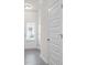 Bright entryway with white door and gray flooring at 281 Dupont Dr # 41, Cartersville, GA 30121