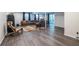 Spacious finished basement featuring a large sectional sofa at 2849 Crescendo Nw Dr, Atlanta, GA 30318