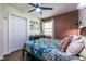 Charming bedroom with teal bedding and an accent wall at 2849 Crescendo Nw Dr, Atlanta, GA 30318
