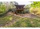House back view, deck, stairs, wooded area at 2849 Crescendo Nw Dr, Atlanta, GA 30318