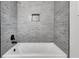 Simple bathroom with gray tile shower surround at 628 Ridge Rd, Dallas, GA 30157