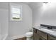 Small bathroom with single vanity and shower/tub combo at 628 Ridge Rd, Dallas, GA 30157