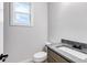 Bathroom with gray vanity and a single sink at 628 Ridge Rd, Dallas, GA 30157