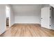 Spacious bedroom with wood-look floors and ensuite bathroom access at 628 Ridge Rd, Dallas, GA 30157
