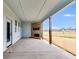 Covered patio with fireplace and rural view at 628 Ridge Rd, Dallas, GA 30157