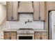Stainless steel range and hood in modern kitchen at 628 Ridge Rd, Dallas, GA 30157