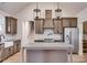 Modern kitchen with stainless steel appliances and an island at 628 Ridge Rd, Dallas, GA 30157